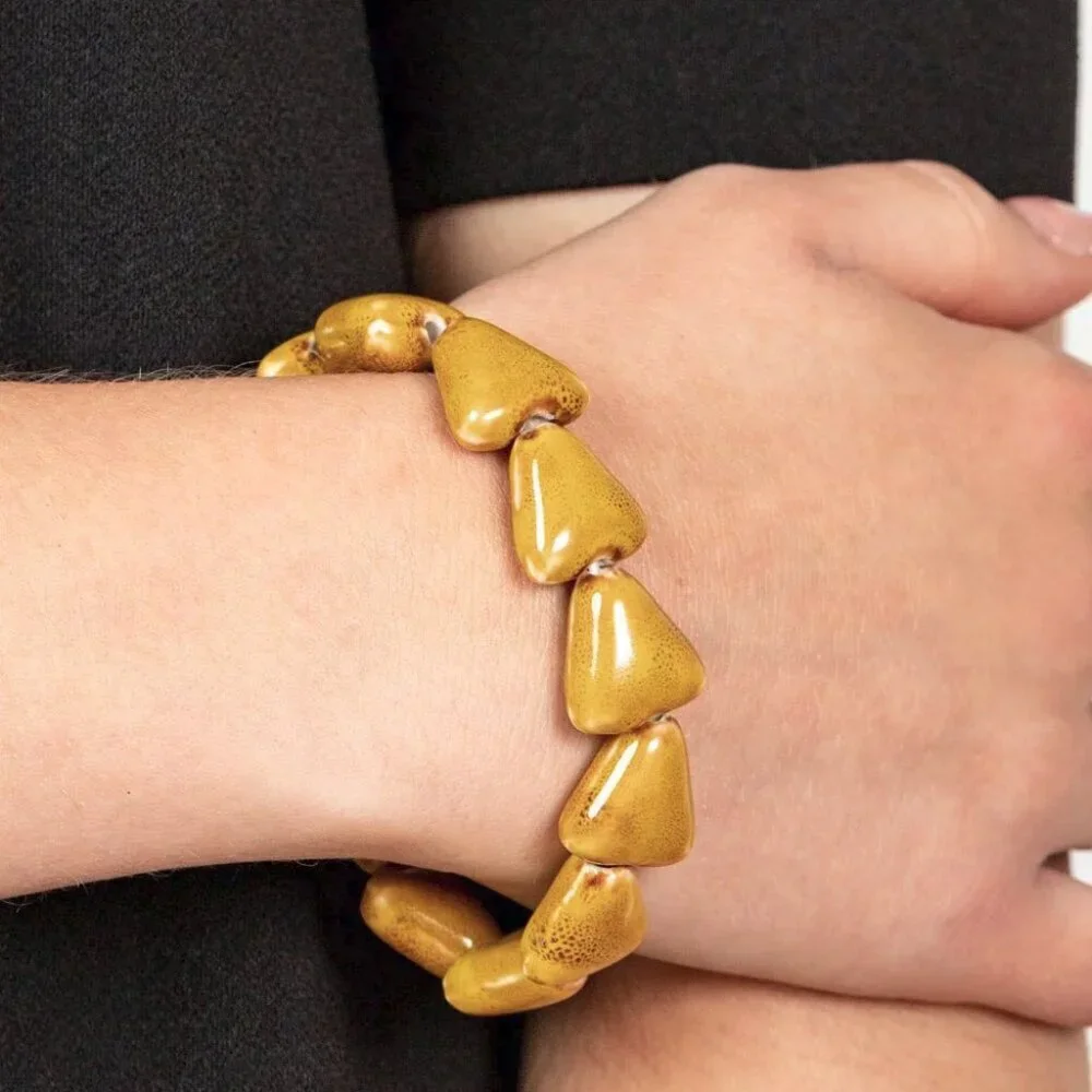 Paarazzi Jewelry Accessories - Shark Out of Water - Yellow Bracelet - Vintage